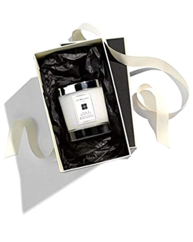 Jo Malone packaging for English Pear & Freesia candle, premium gift-ready presentation.