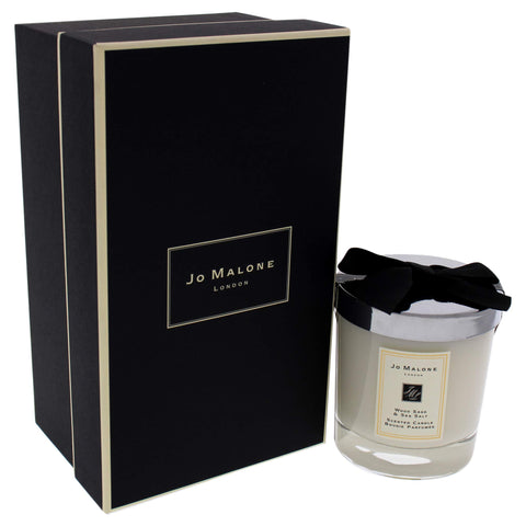 Jo Malone Wood Sage and Sea Salt candle design adds understated luxury to a room.