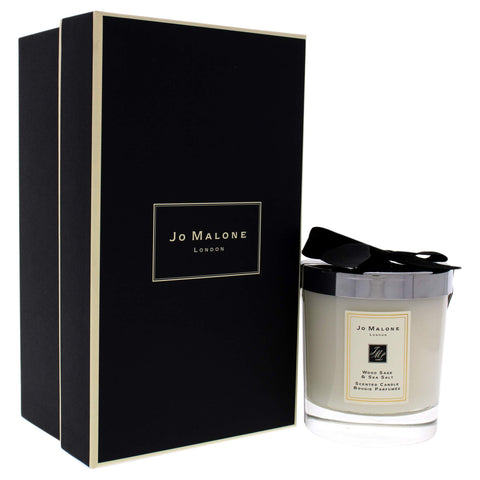 Jo Malone Wood Sage and Sea Salt is lit to create a serene evening.