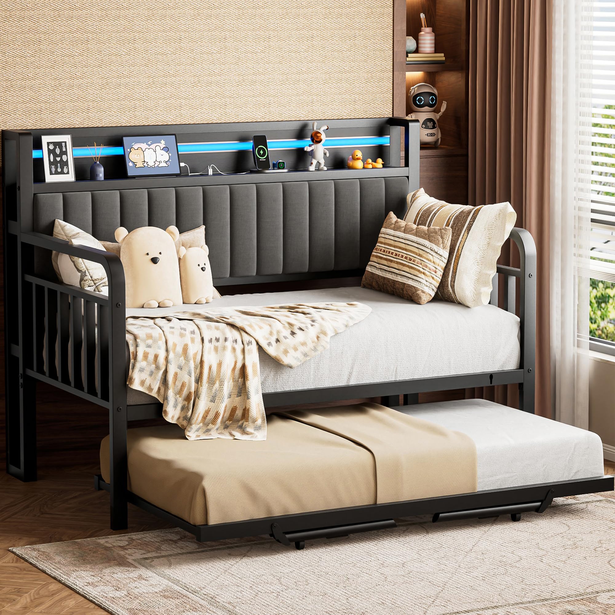 Jocoevol daybed with trundle and LED light shows the pop-up wheel mechanism.
