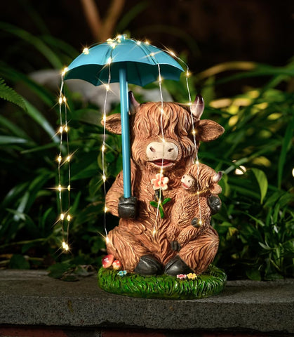 Joint Honglin solar garden statue of a Highland cow with umbrella lights for cozy evenings.
