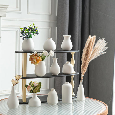 JOJUNO white bud vases collection adds timeless porcelain elegance to decor.
