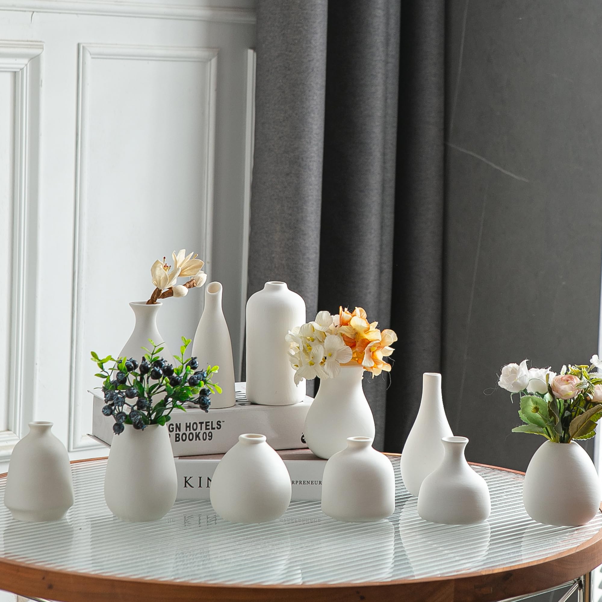 JOJUNO white bud vases set of 11 with varied sizes for layered floral displays.