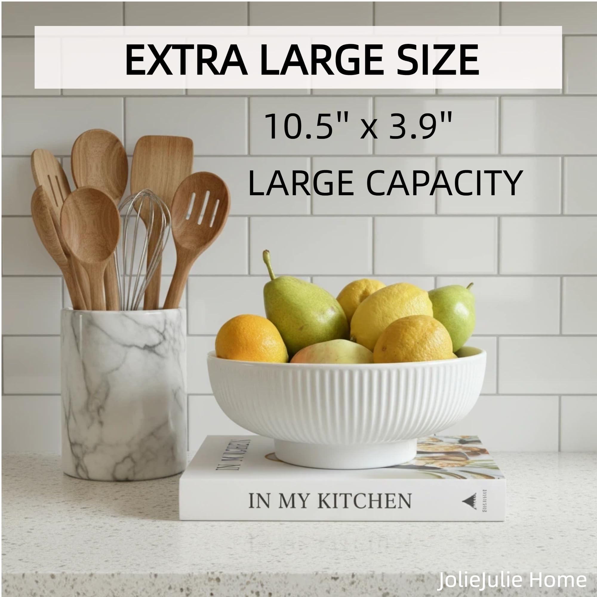 JolieJulie cream white bowl used as entryway organizer for keys and purse.