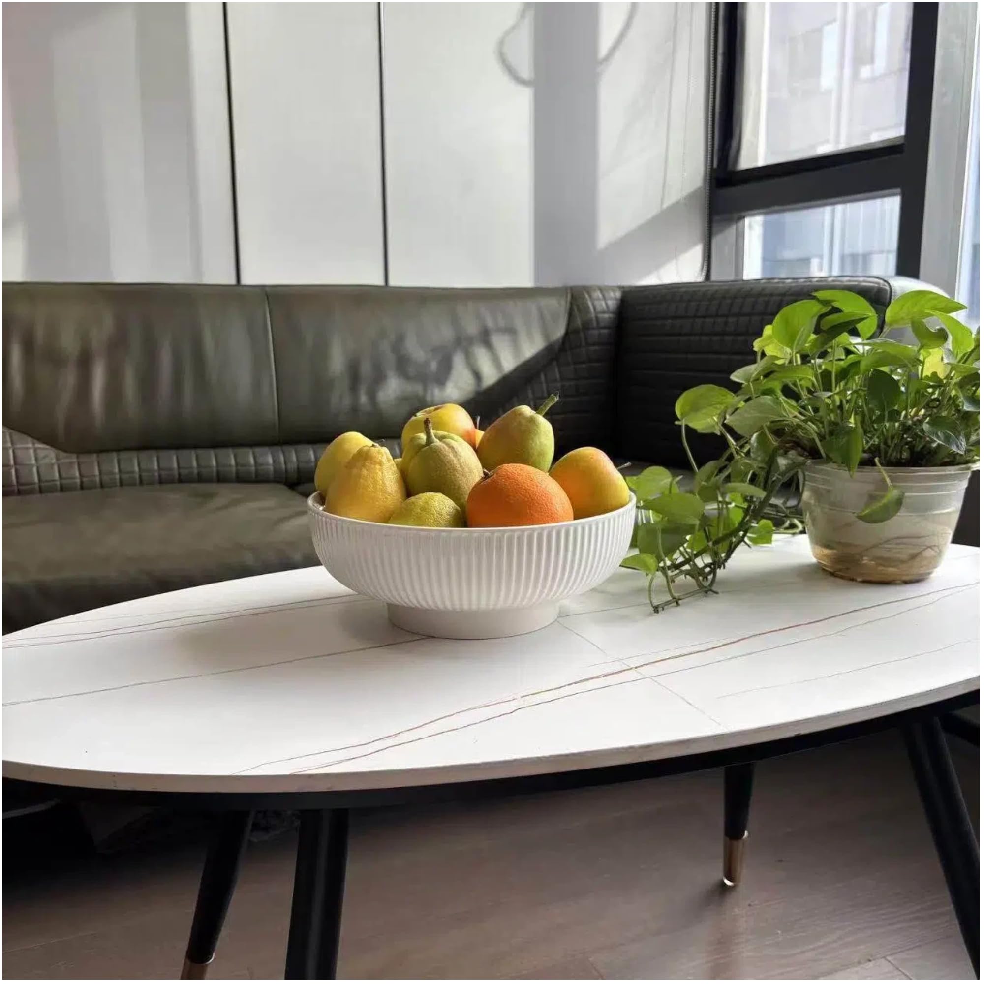 Cream-white ceramic provides a versatile focal point for kitchens and dining spaces.