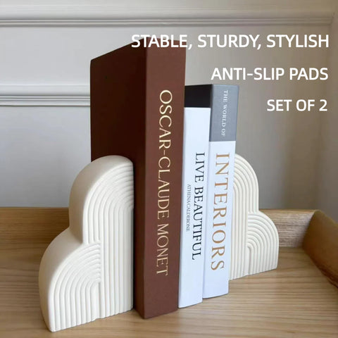 Cream-white JolieJulie bookends add modern decor to any shelf.