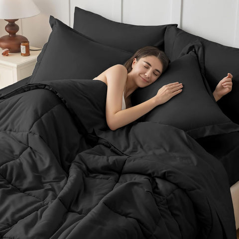 JOLLYVOGUE Down-alternative bedding provides soft, year-round warmth.