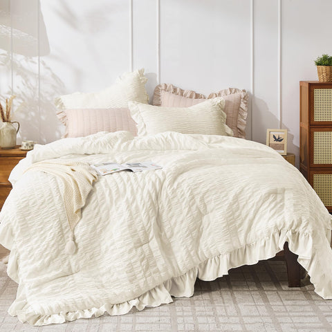 JOLLYVOGUE Ivory Queen comforter set with seersucker texture and ruffle trim.