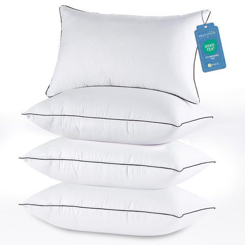 JOLLYVOGUE queen four-pack pillows with generous loft for all sleeping positions.