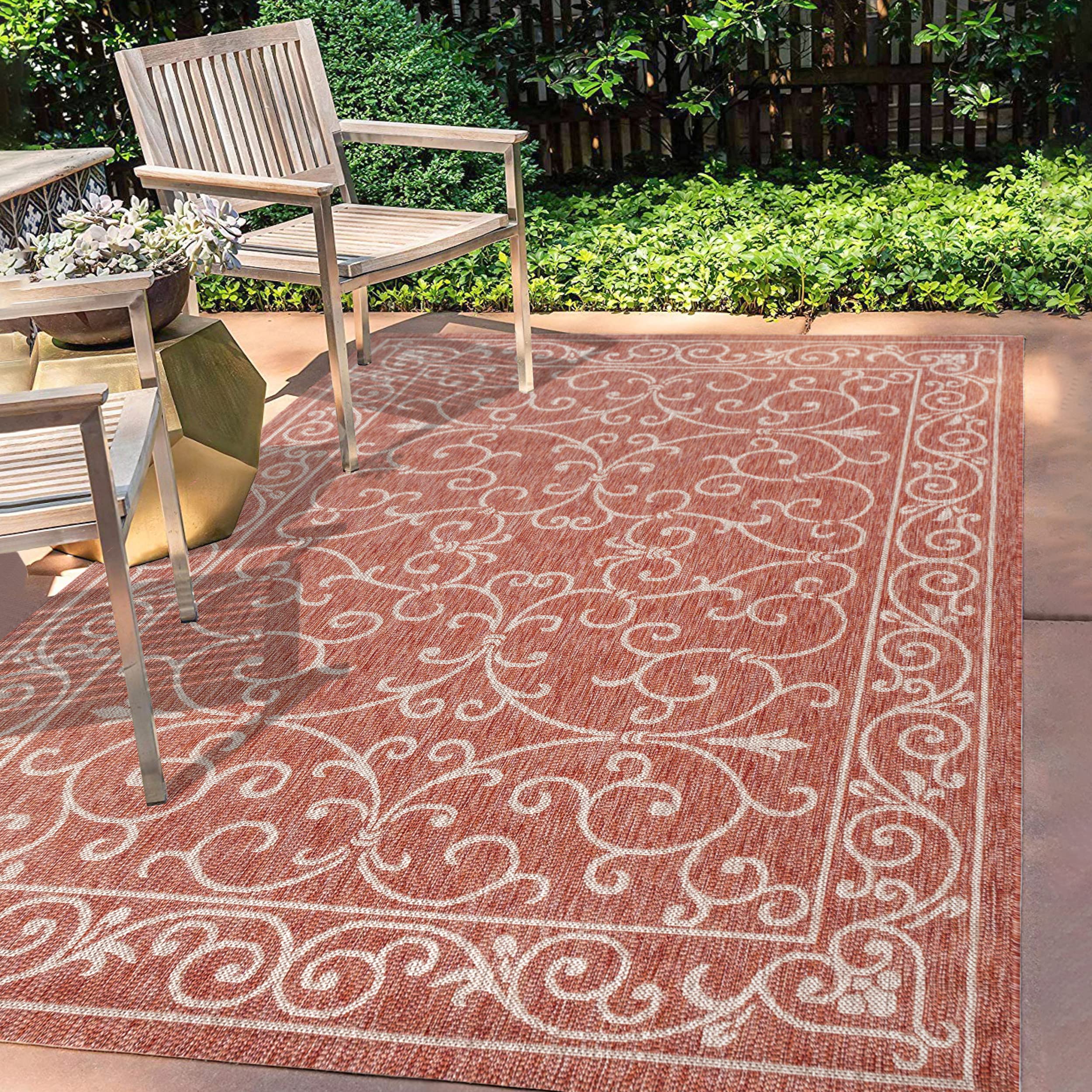 JONATHAN Y Flat-weave polypropylene rug for high-traffic spaces.