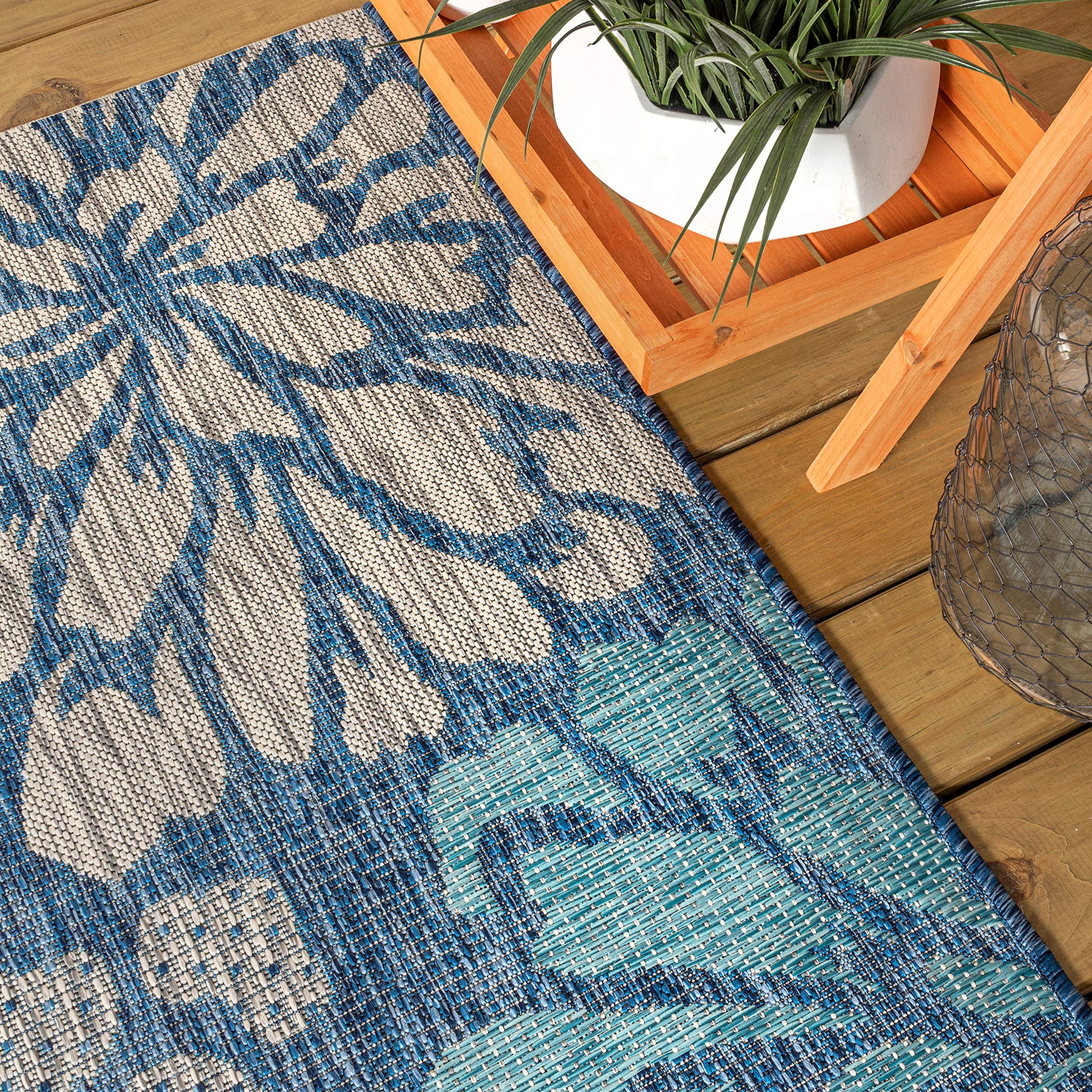 Jonathan Y easy-care rug can be washed with mild soap and hose rinse.