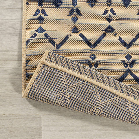 Jonathan Y Ourika flatweave polypropylene construction for durable easy-care.