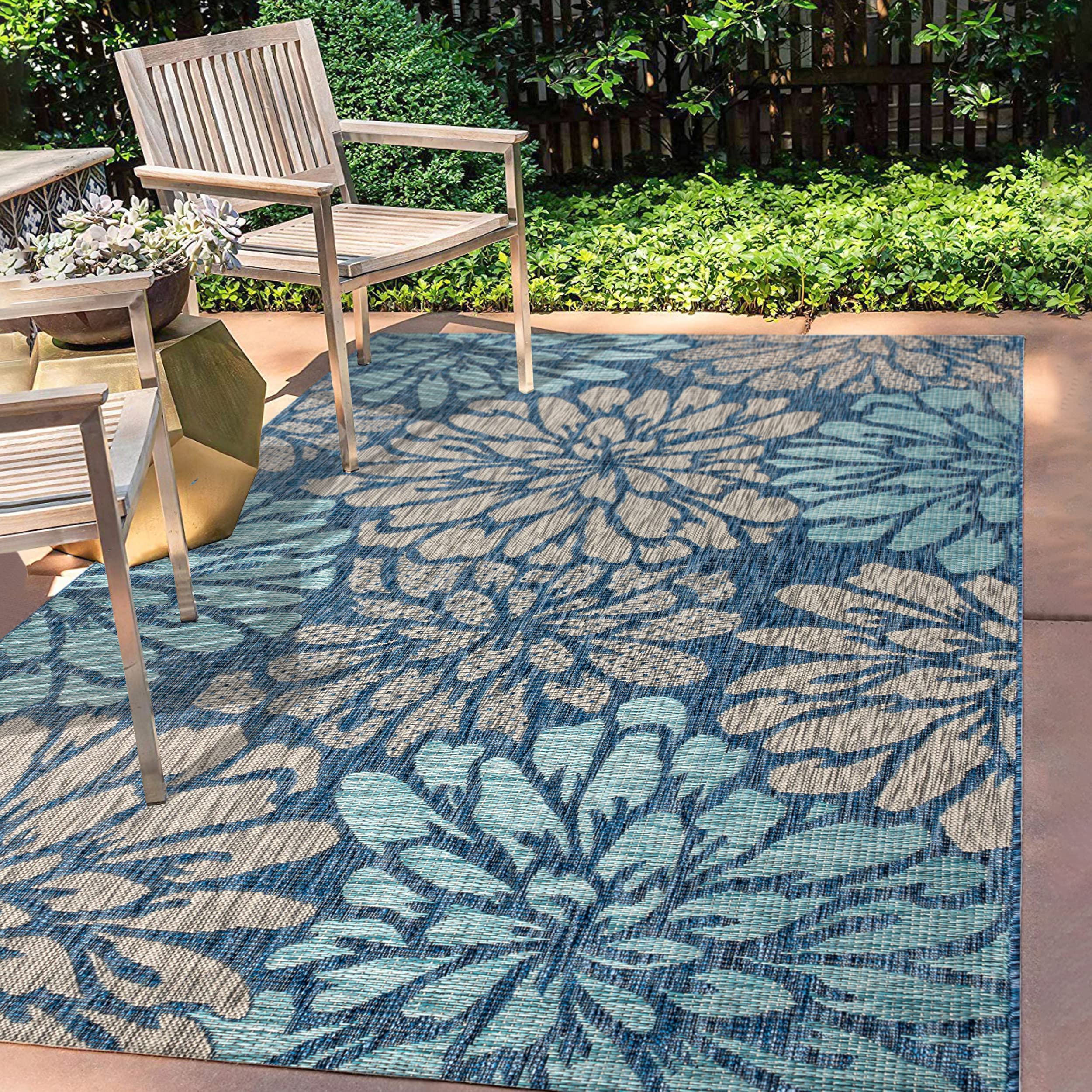 Jonathan Y floral textured weave rug with navy aqua zinnia pattern for outdoor high-traffic spaces.