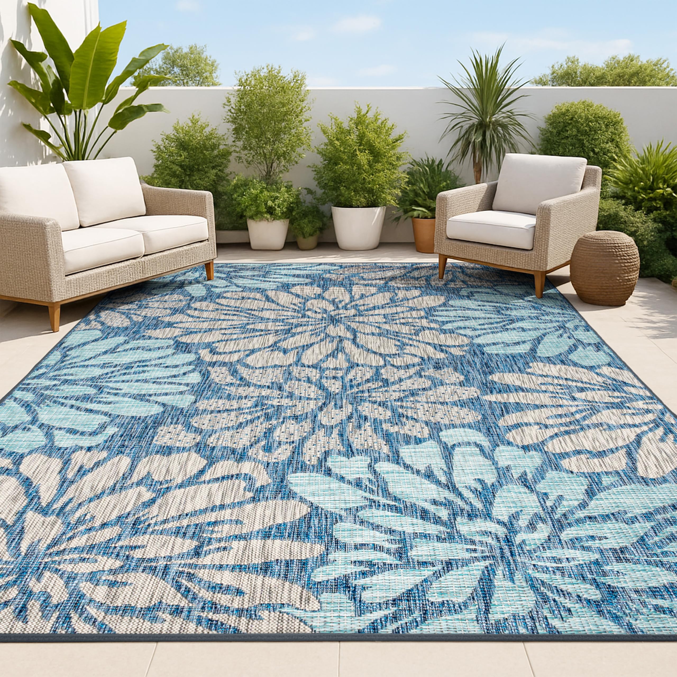 Jonathan Y Floral Textured Weave rug pattern closeup shows bold navy and aqua blooms.