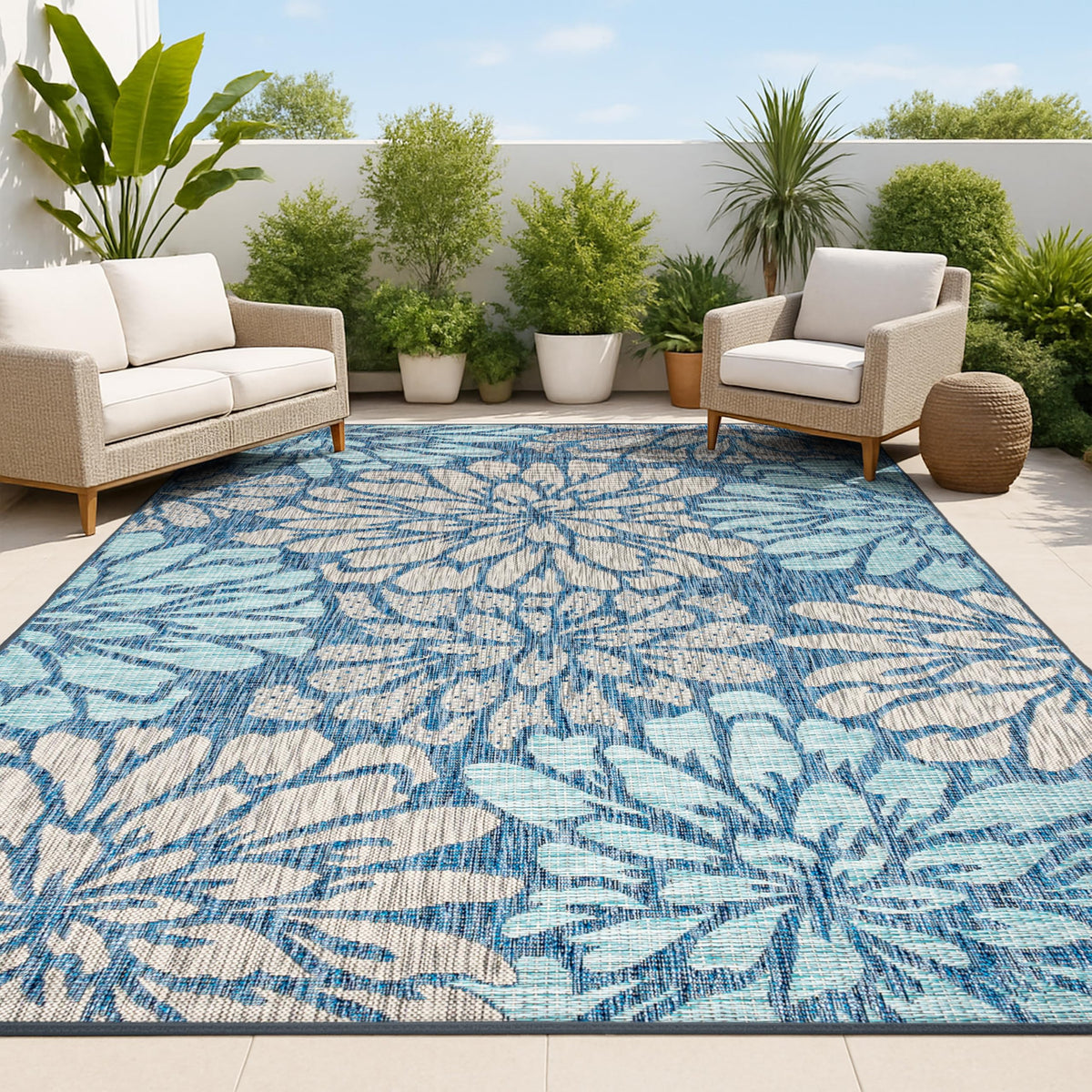 Jonathan Y Floral Textured Weave rug pattern closeup shows bold navy and aqua blooms.