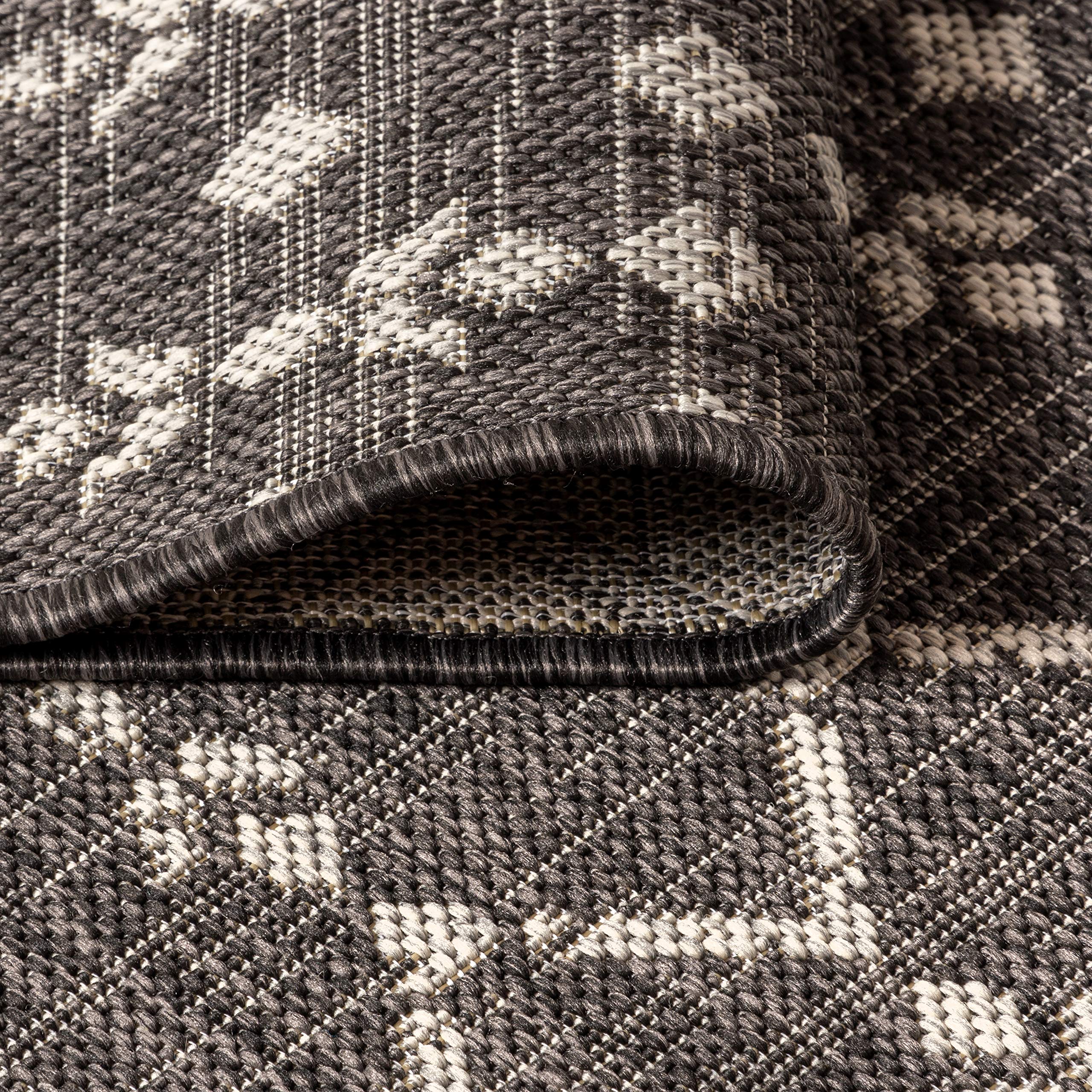 JONATHAN Y indoor-outdoor rug offers low-pile practicality for high-traffic areas.