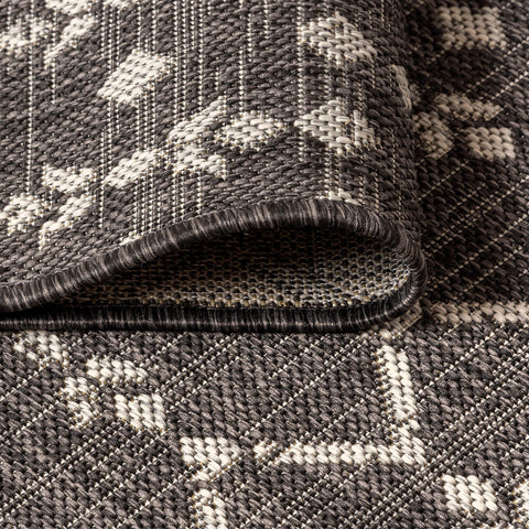 JONATHAN Y indoor-outdoor rug offers low-pile practicality for high-traffic areas.