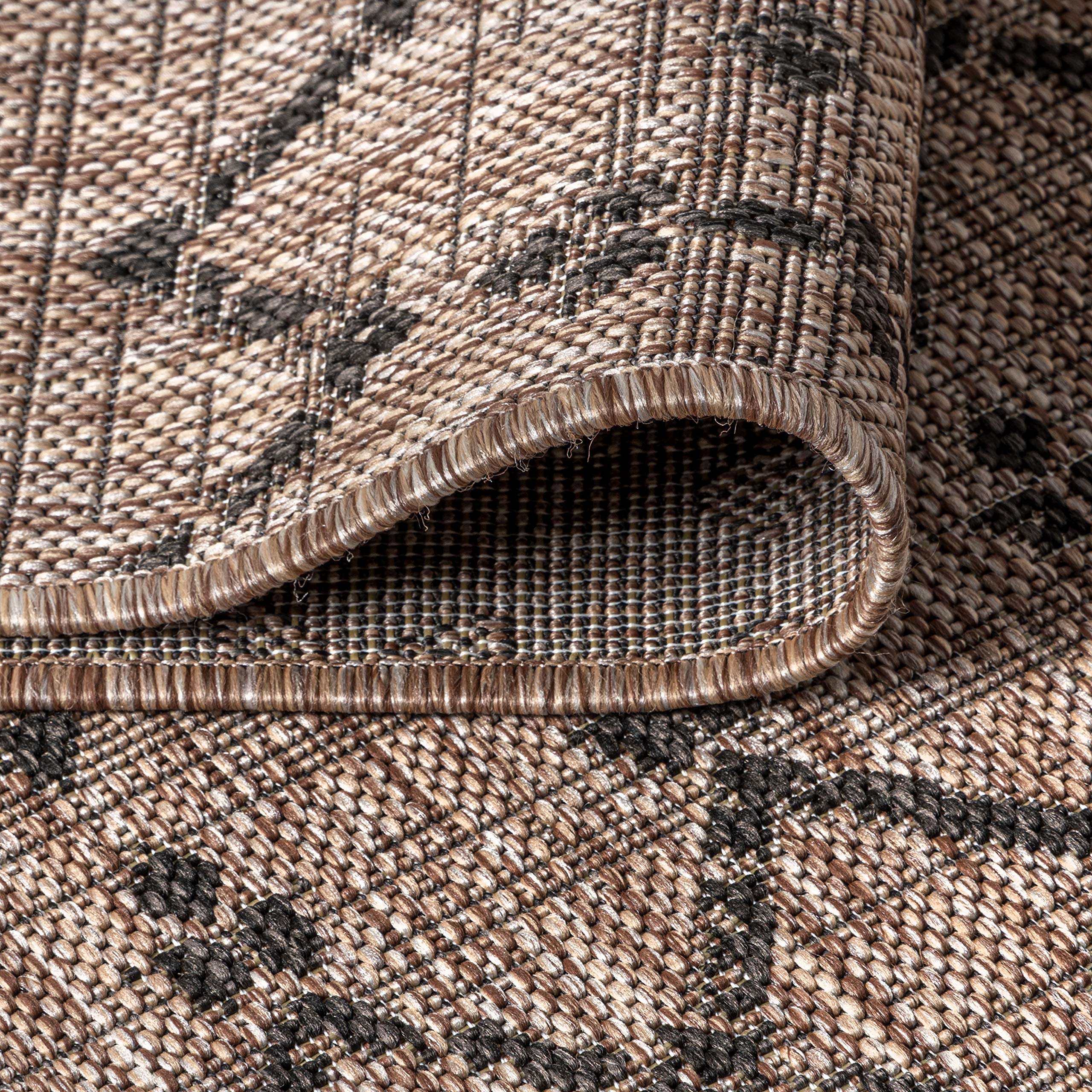 Jonathan Y stain-resistant outdoor rug resists fading and spills.