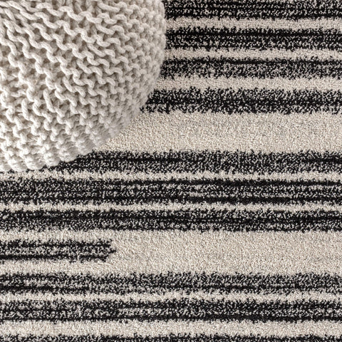 Jonathan Y Khalil stripe rug backside with jute backing adds durable support