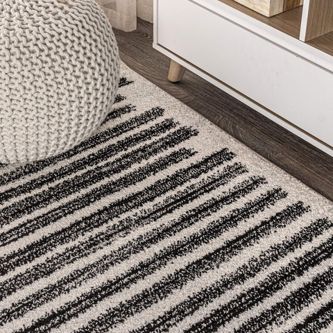 Jonathan Y Khalil stripe rug low-pile construction minimizes shedding and dirt retention