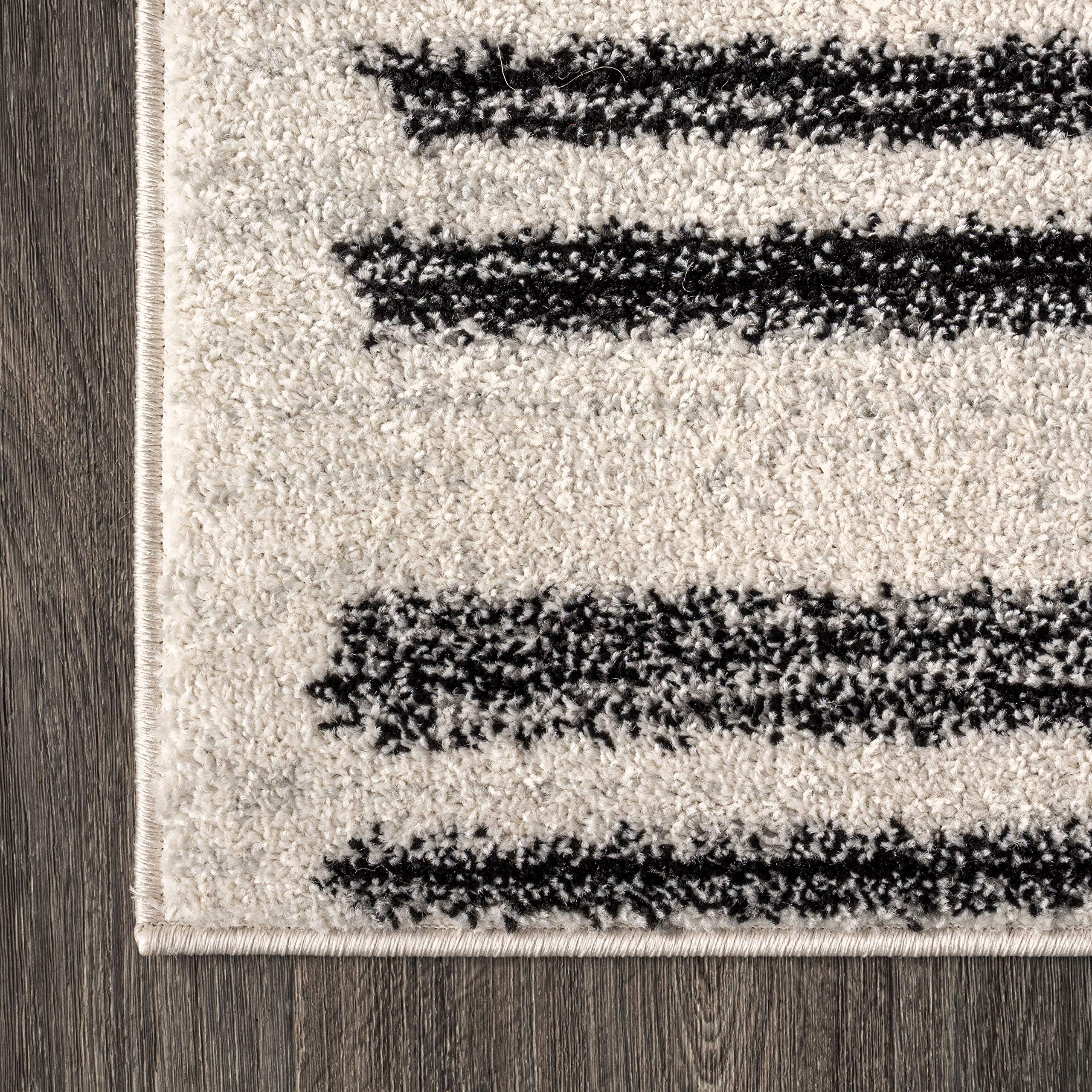 Jonathan Y Khalil stripe rug pet-friendly design stays resilient in busy homes