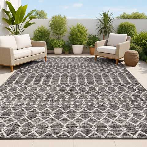 JONATHAN Y Ourika Moroccan rug on a porch blends boho charm with outdoor durability.