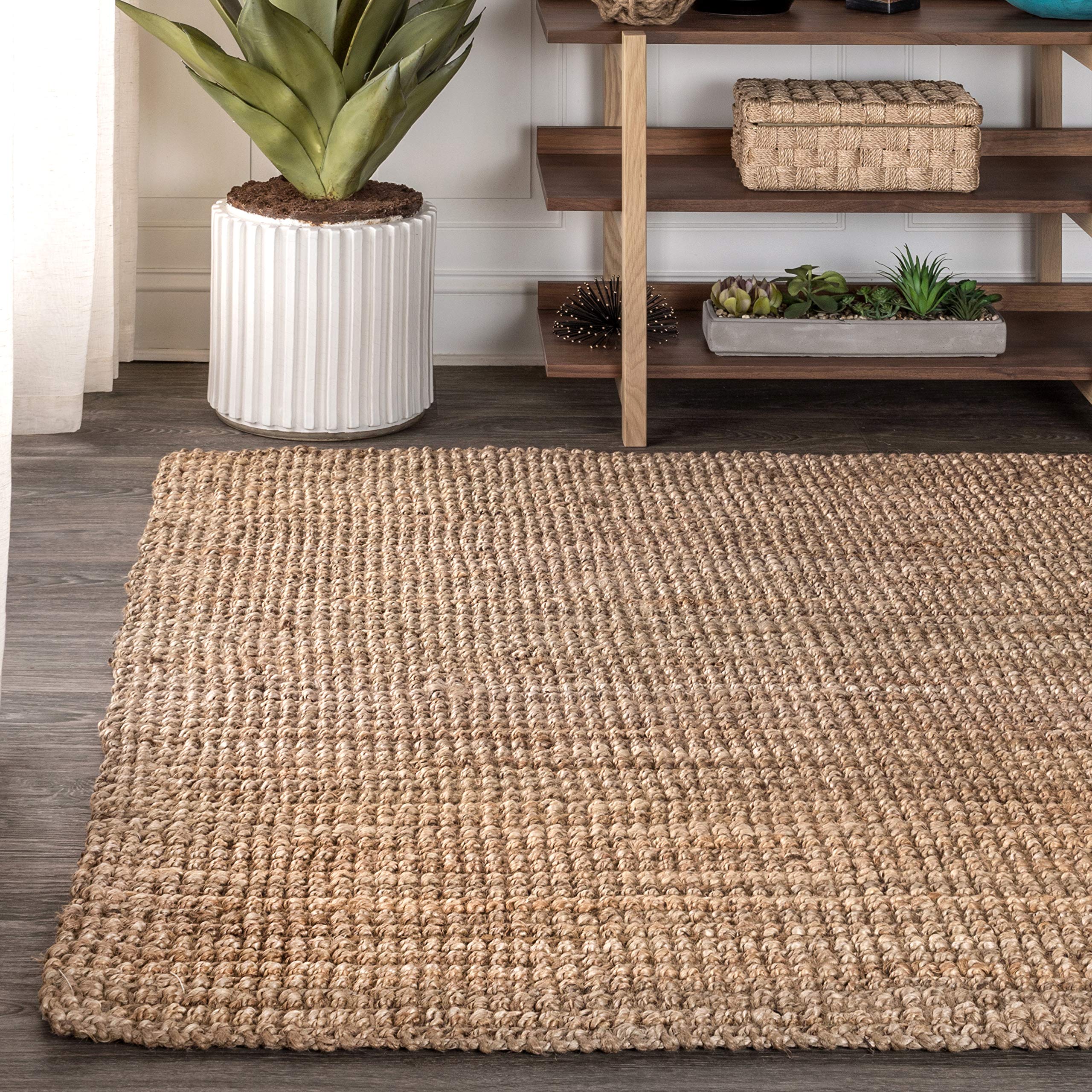 Jonathan Y Pata natural jute fiber rug in living room setting with bohemian flair