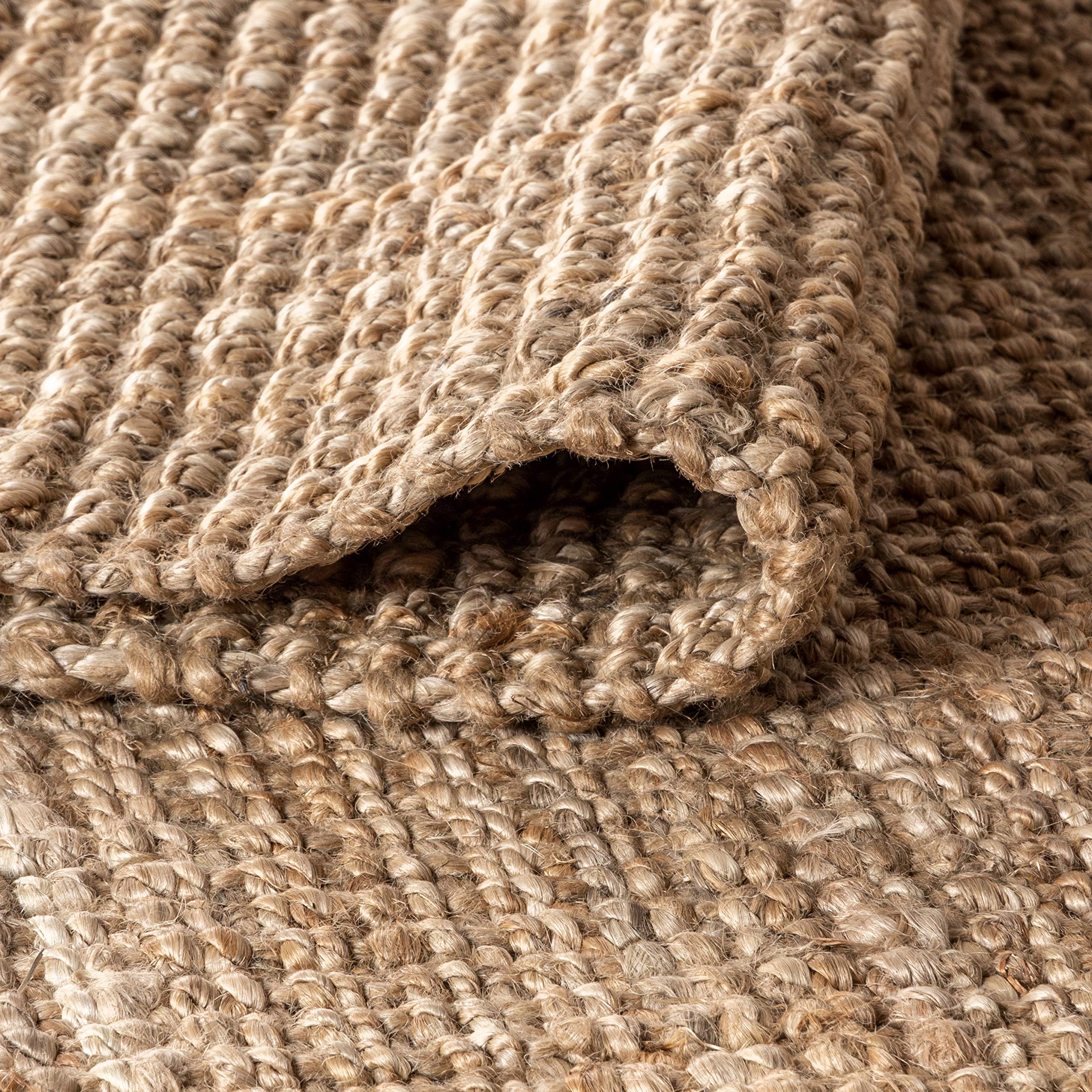Non-slip feel helps anchors on smooth flooring by Jonathan Y Pata rug