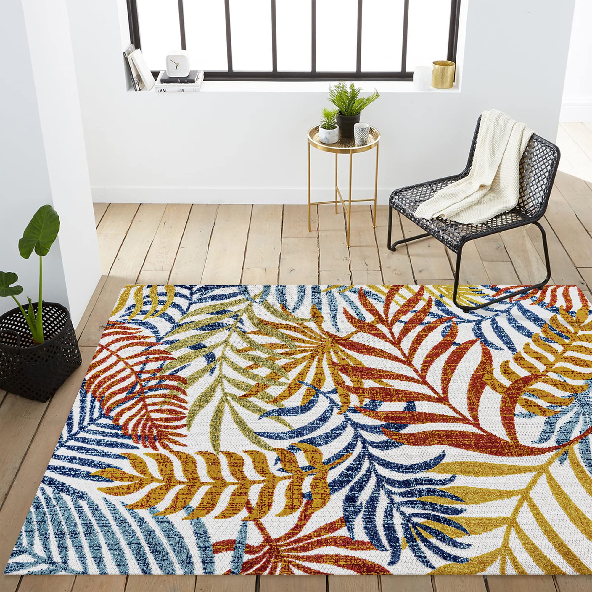 Jonathan Y Tropics rug in backyard scene showcasing easy-care maintenance.
