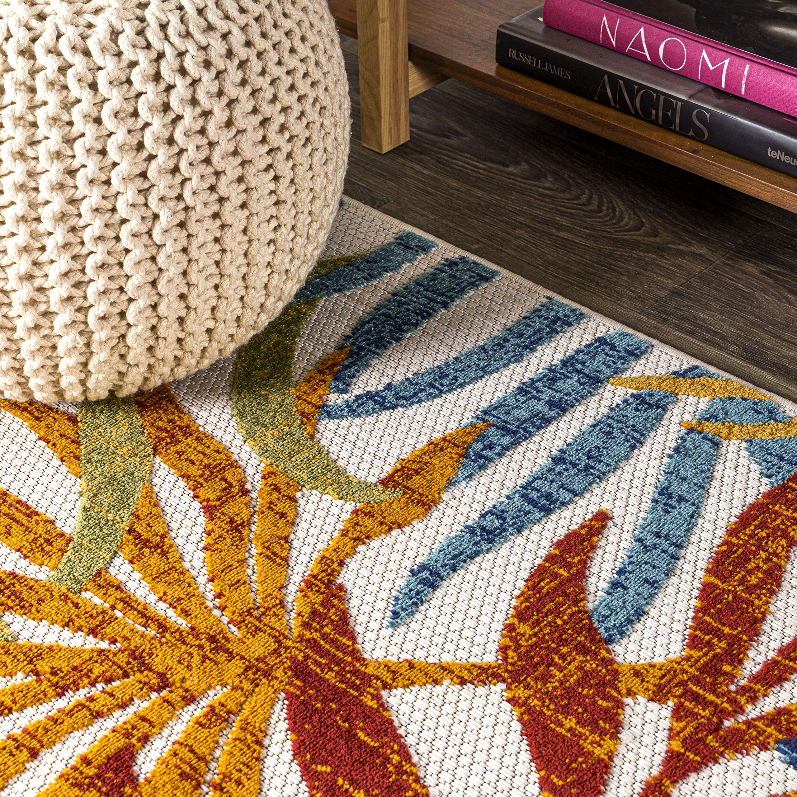 Jonathan Y Tropics indoor-outdoor durability suits kitchens, patios, and entryways.