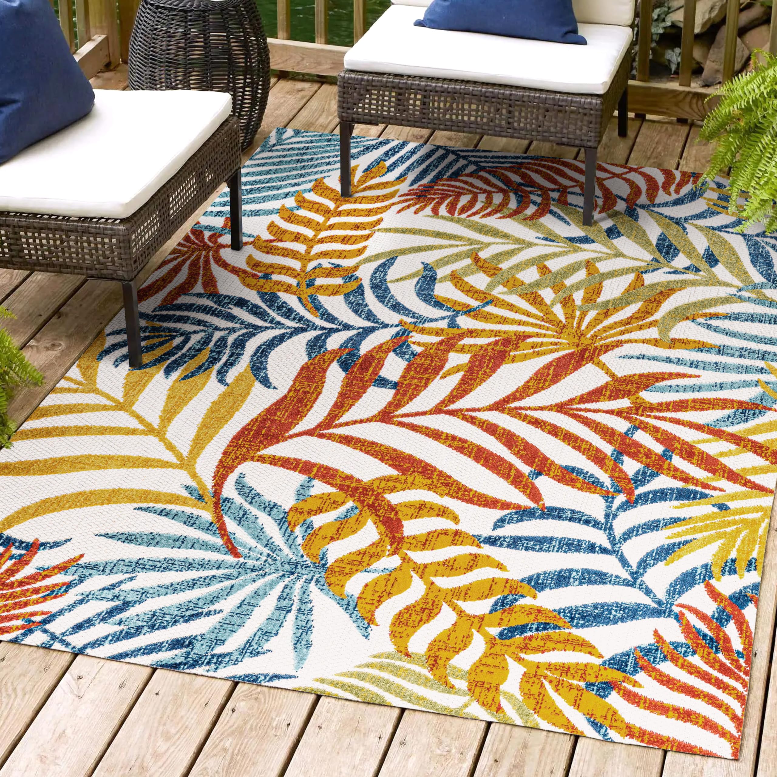 Jonathan Y Tropics outdoor indoor rug in patio setup for high-traffic areas.