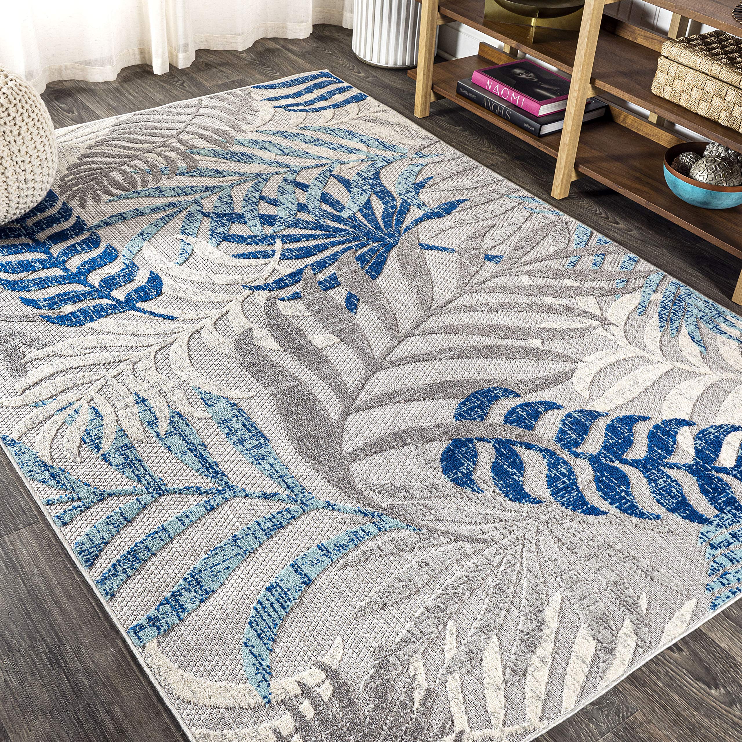 JONATHAN Y Tropics palm leaves rug kids and pets-friendly configuration with stain-resistant fibers.
