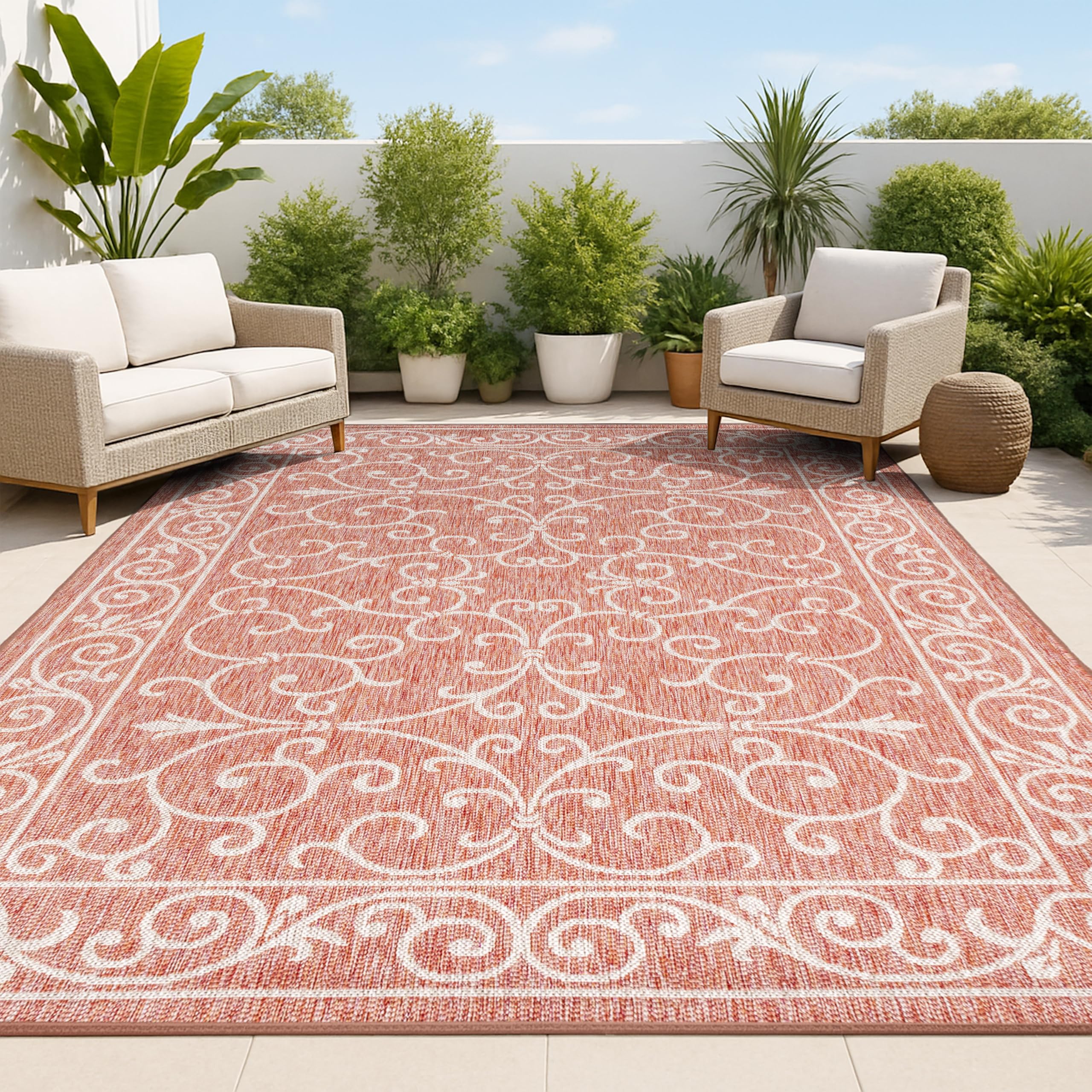 JONATHAN Y Vintage Filigree area rug in red and beige for outdoor patios.