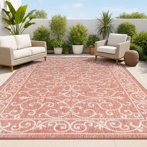JONATHAN Y Vintage Filigree area rug in red and beige for outdoor patios.