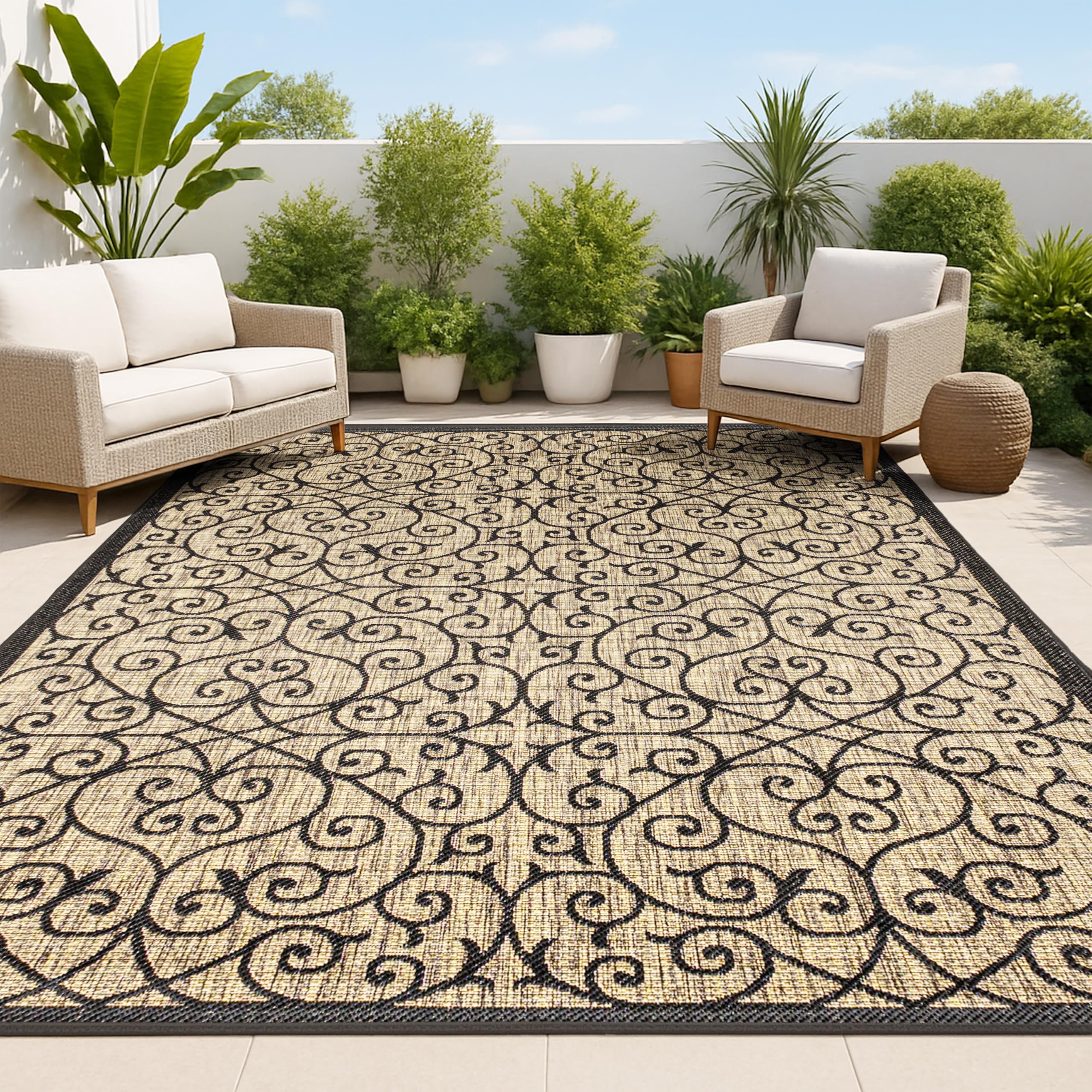 Jonathan Y vintage filigree rug full view in black and khaki for outdoor spaces