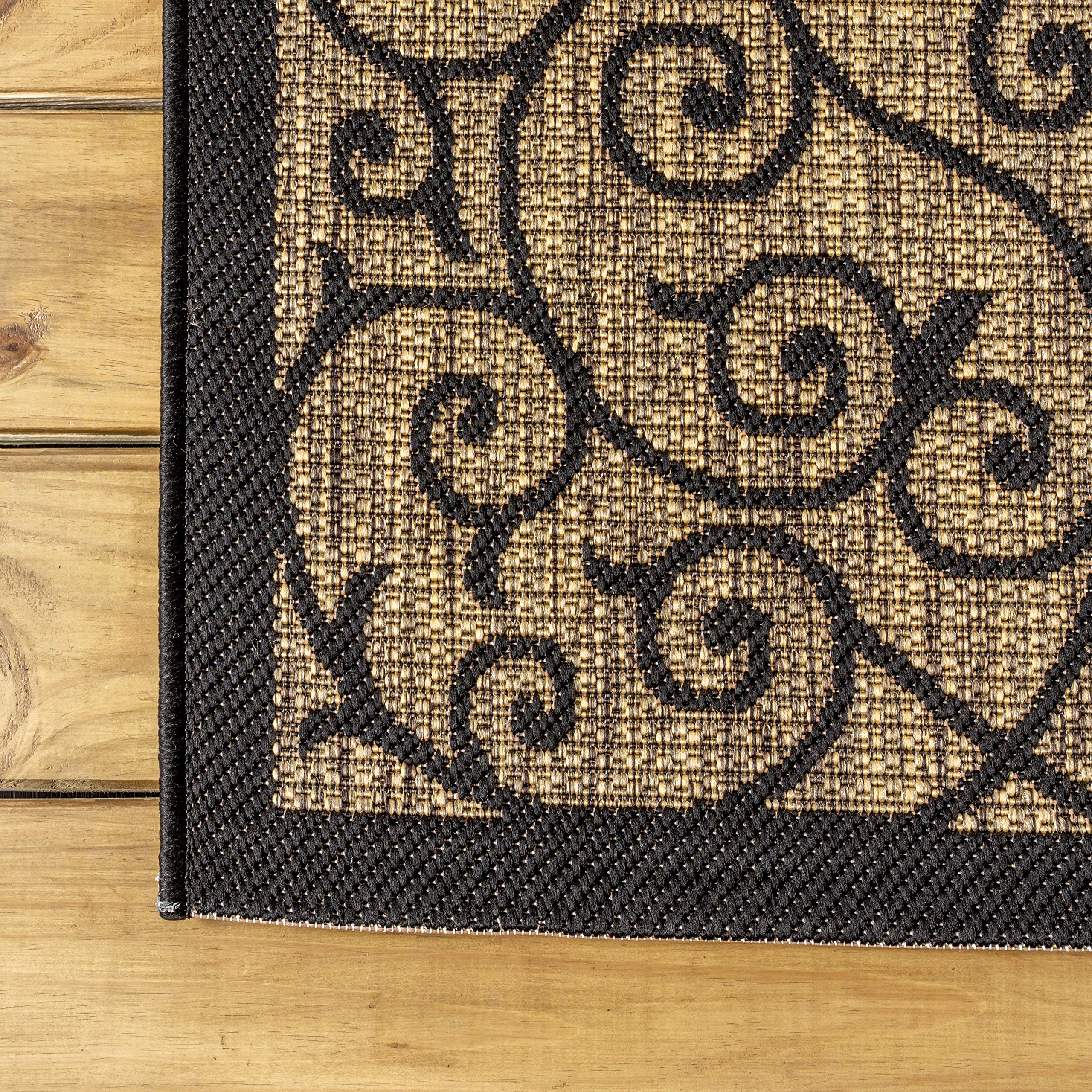Jonathan Y Vintage Filigree rug in black and khaki elevating outdoor decor.