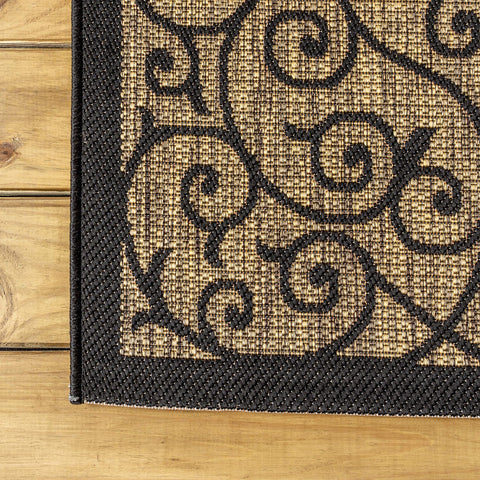 Jonathan Y Vintage Filigree rug in black and khaki elevating outdoor decor.