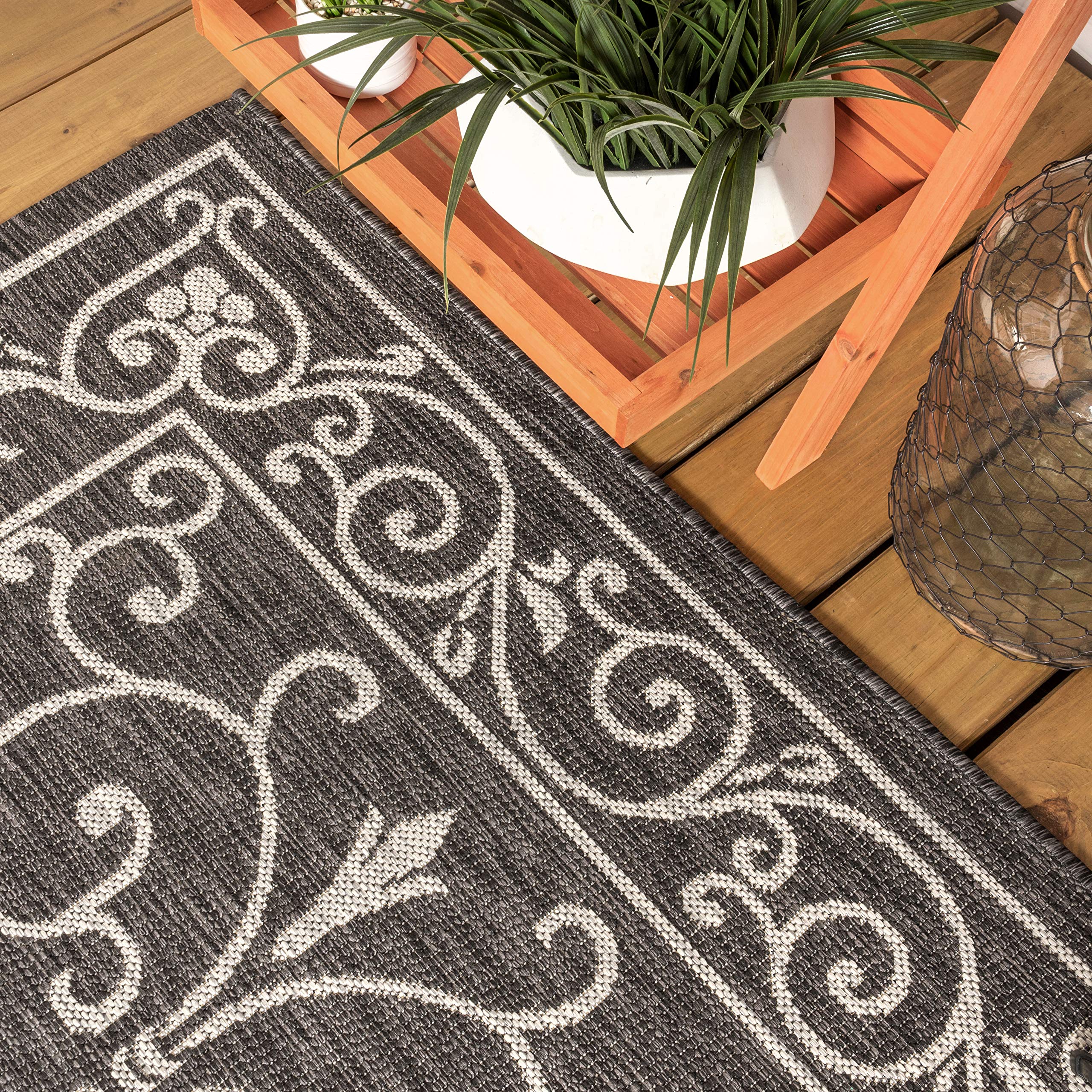 Jonathan Y handwoven-like texture adds vintage charm to outdoor spaces.