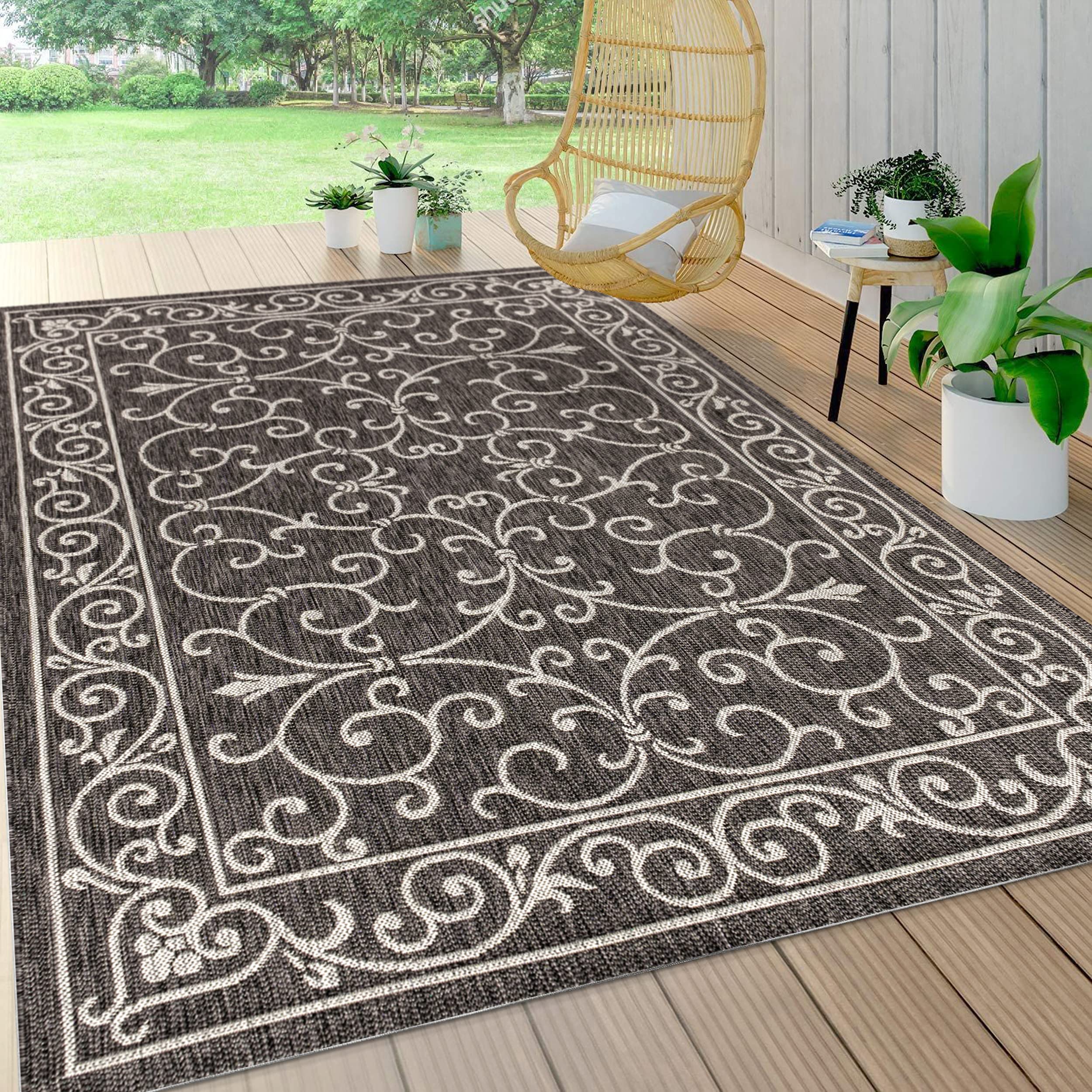 Jonathan Y vintage filigree rug, flatweave texture, suited for busy entryways and patios.