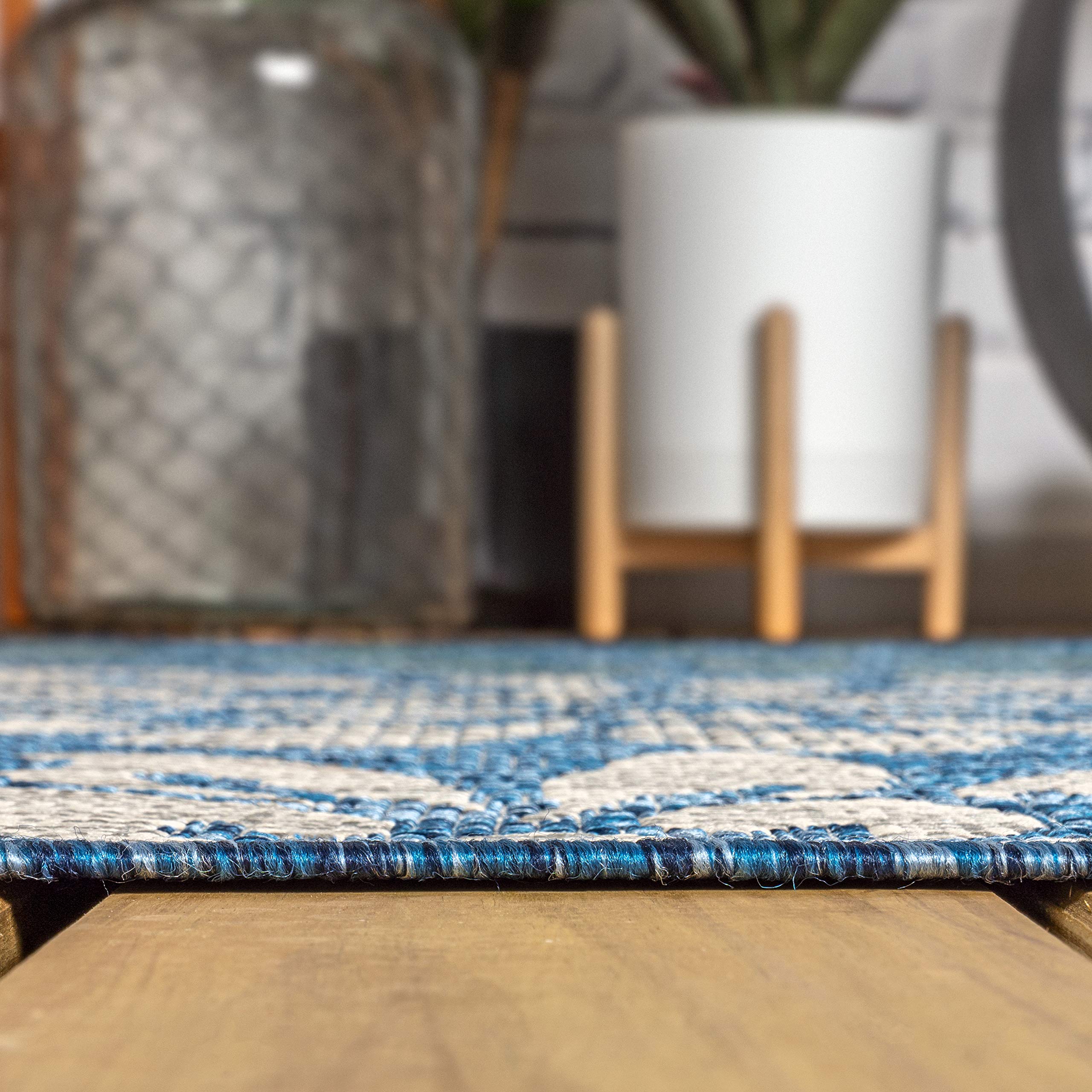Jonathan Y zinnia-inspired motif adds graphic flair to decks, patios, and porches.