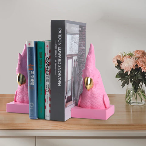JOOMBE Pink Parrot bookends on a shelf present a thoughtful gift option