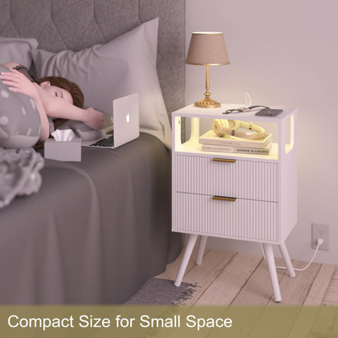 JOONEE nightstand drawers open showcasing handy storage for remotes and glasses.