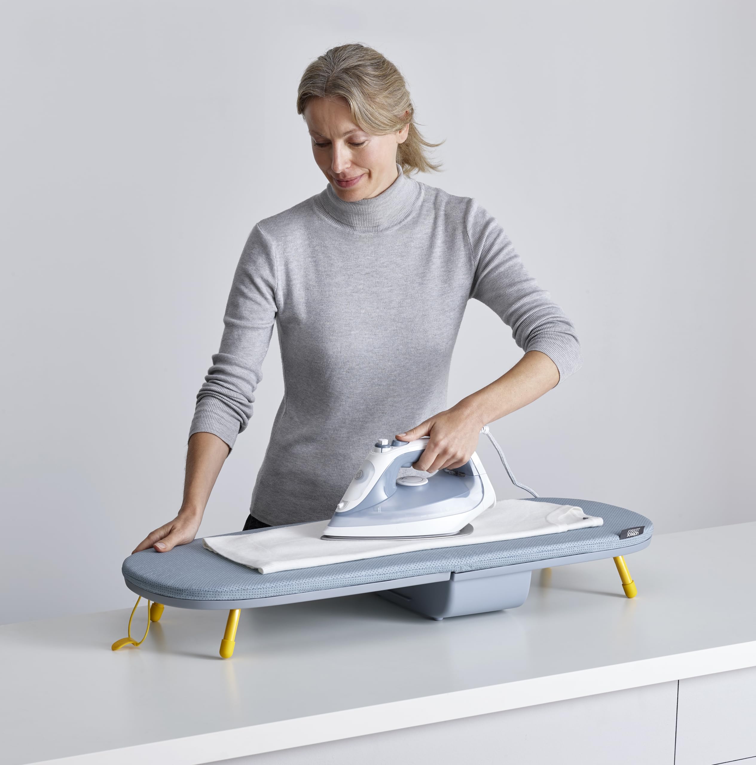 Pocket Max hanging hook mounted on wall for convenient vertical storage
