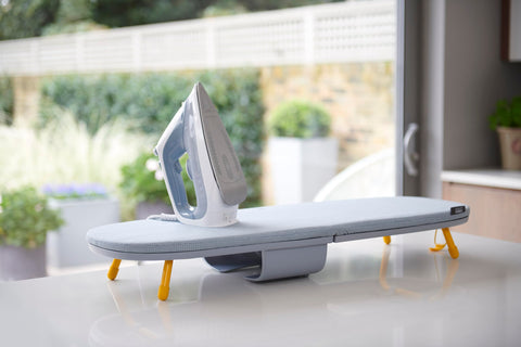 Pocket Max ironing board with built in iron storage compartment keeps essentials organized