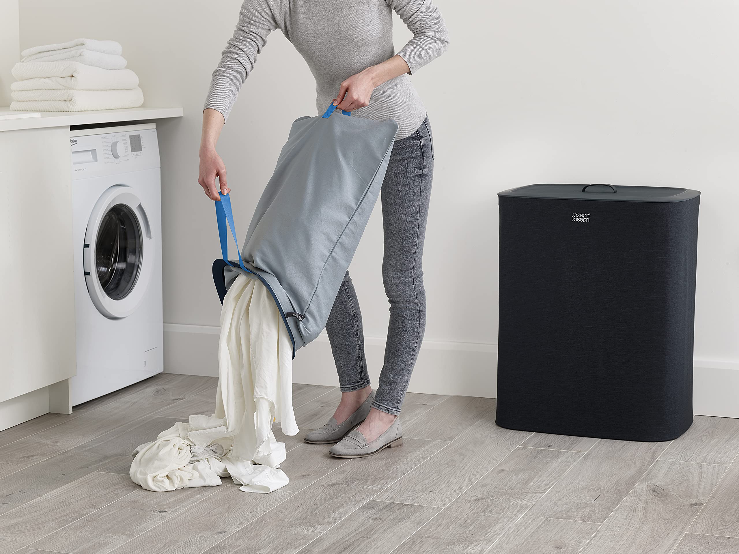 Joseph Joseph Tota dual-compartment system helps separate light and dark fabrics