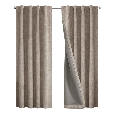 Joydeco blackout curtains with rod-pocket block light while preserving elegant folds for bedroom privacy.