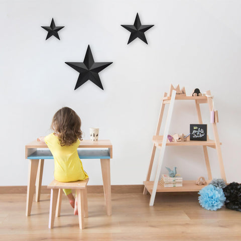 JoyEvy Black Barn Star 9-inch wall decor adds vintage charm to living rooms.