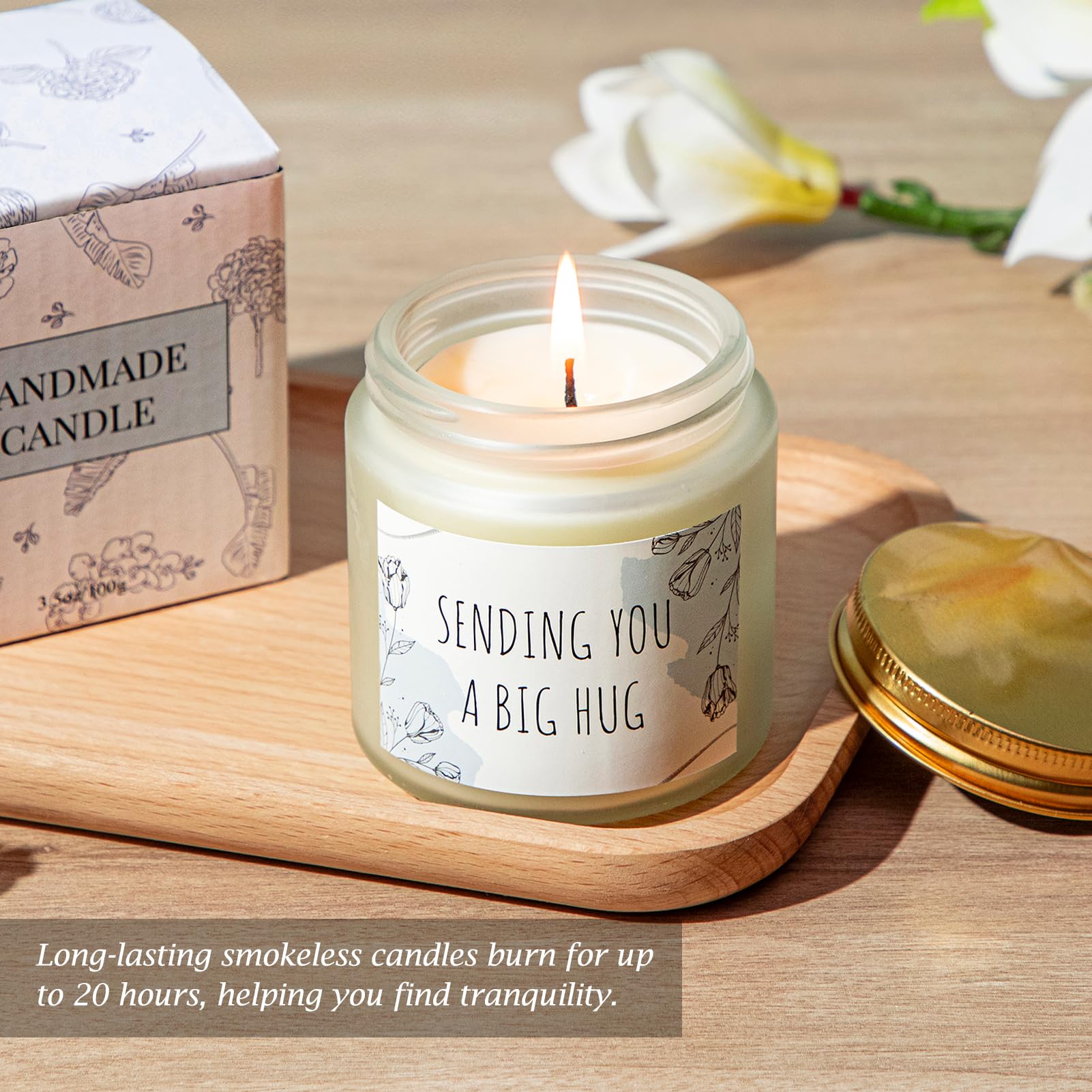 Joyliss scented candle creates a calming atmosphere for reflection.