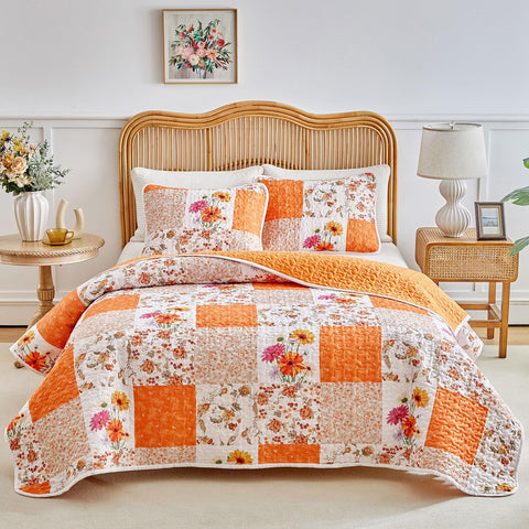 Joyreap floral patchwork quilt queen front view with orange blooms