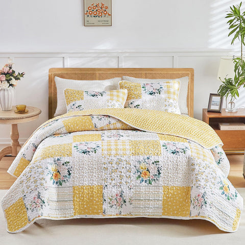 Joyreap floral patchwork quilt with yellow flowers brightens the bedroom.
